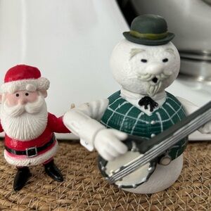 Playing Mantis Santa and Snowman Figurines from Rudolph the red nosed reindeer